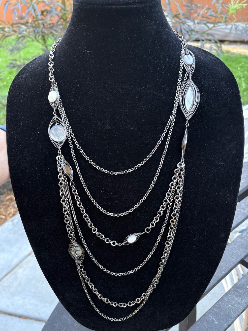 Shell shimmer necklace - multi-strand gunmetal chains and wire-wrapped shell